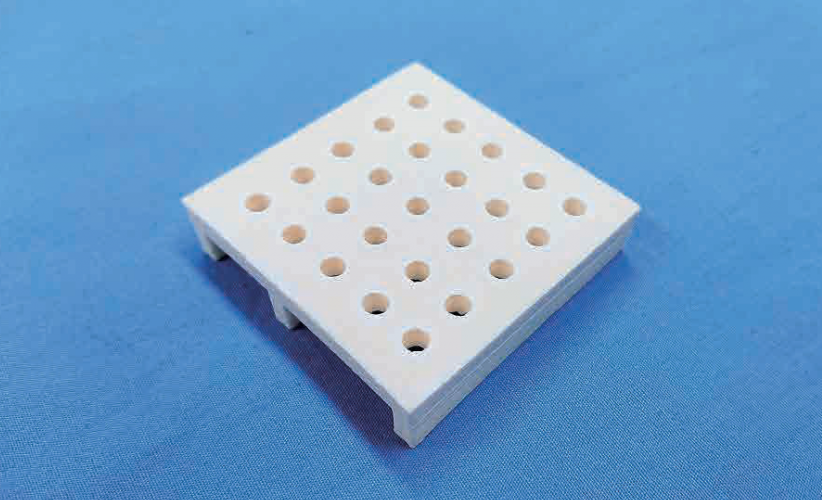 Picture of 3D printed ceramic jig for sintering process